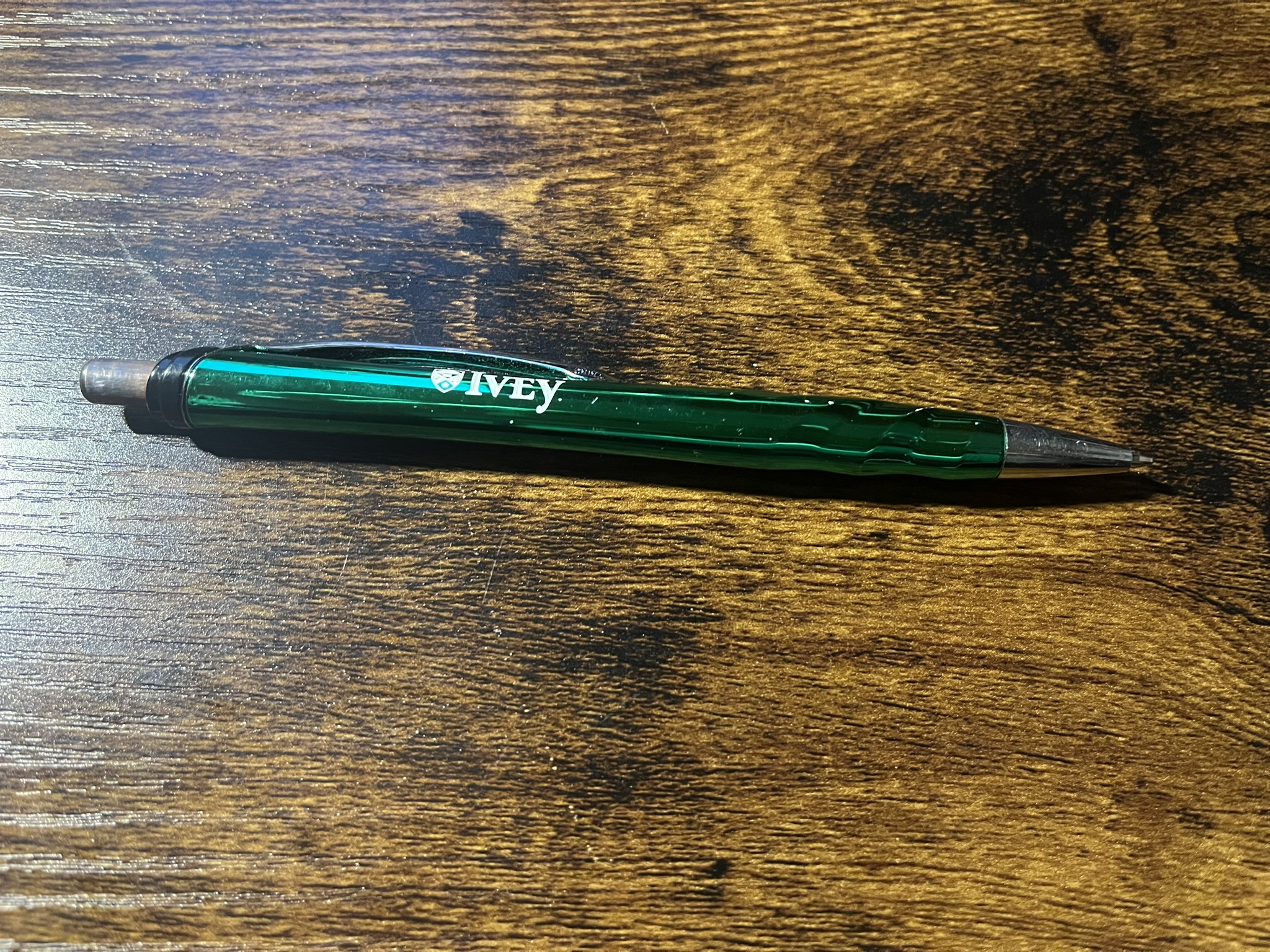 This pen was given to me by my dad because he didn't need it and knows I love green, I use it at work every day and cherish it.<br><audio controls src='/audio/pen.mp3'></audio>