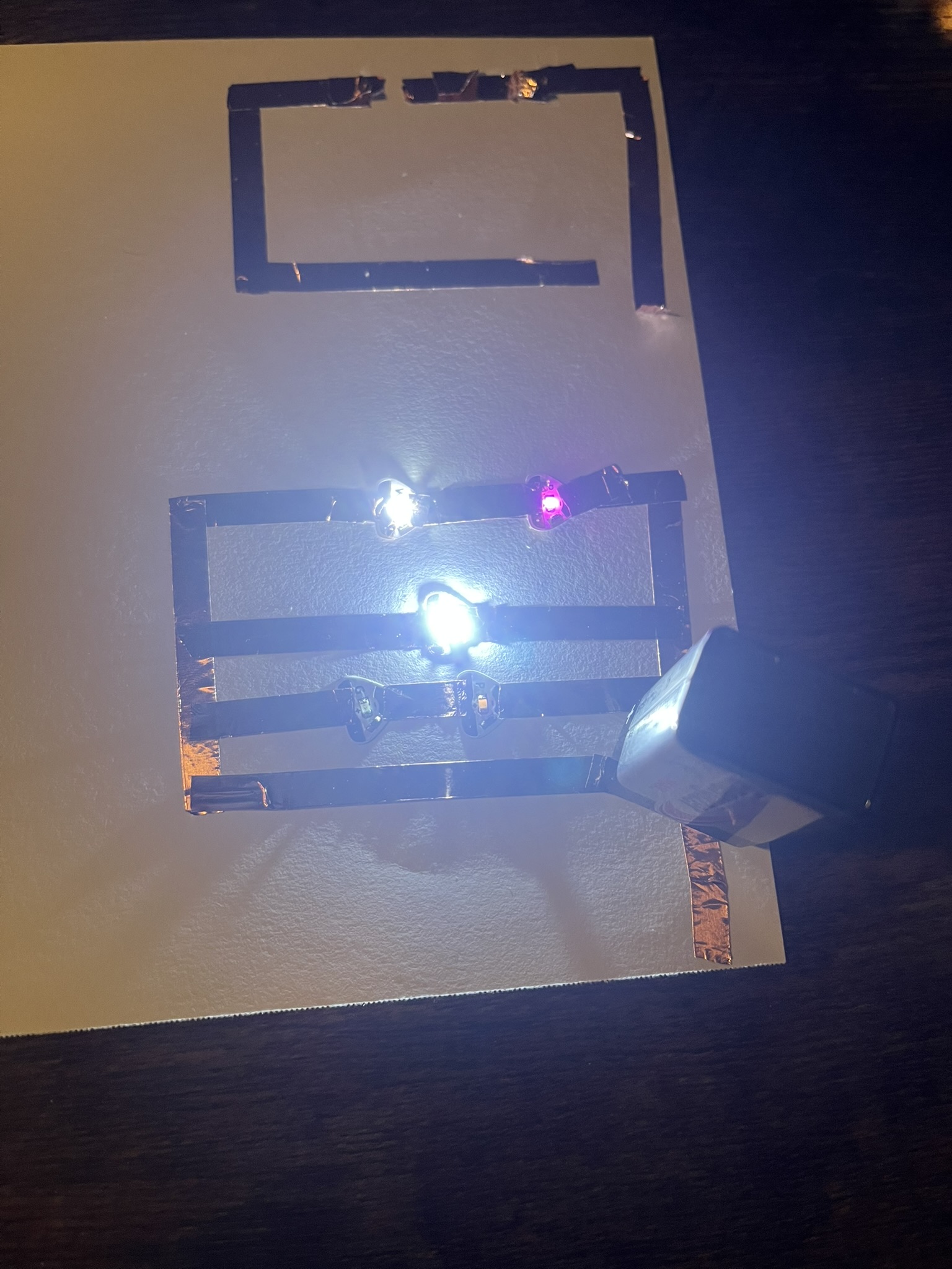 In order to make very basic circuits I spent a lot of time experimenting with series, parallel, and simple circuits using copper tape.